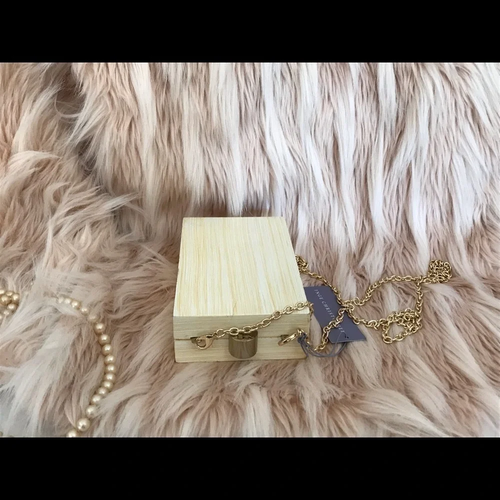 Inge Christopher Aurora tall clutch box